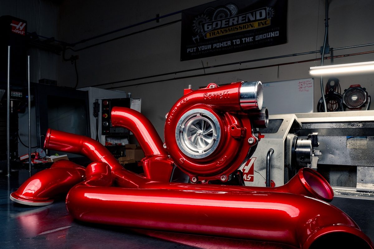 Red DDP turbo and intake piping on the shop floor
